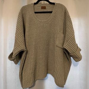 POL oversized sweater with cropped sleeves. Light sage green, from a boutique
